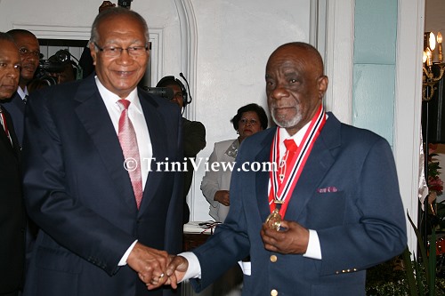 RIGHT: Bertram 'Bertie' Lloyd Marshall receives the Order of the Republic of Trinidad and Tobago