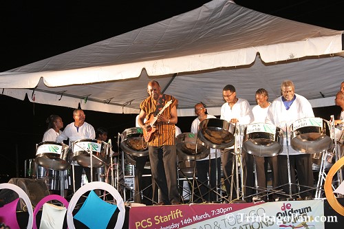 Guitarist, Michael Bootman accompanied by PCS Starlift Steel Orchestra
